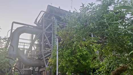 a closed steel structure by nature with metal pipes and scaffolding braces