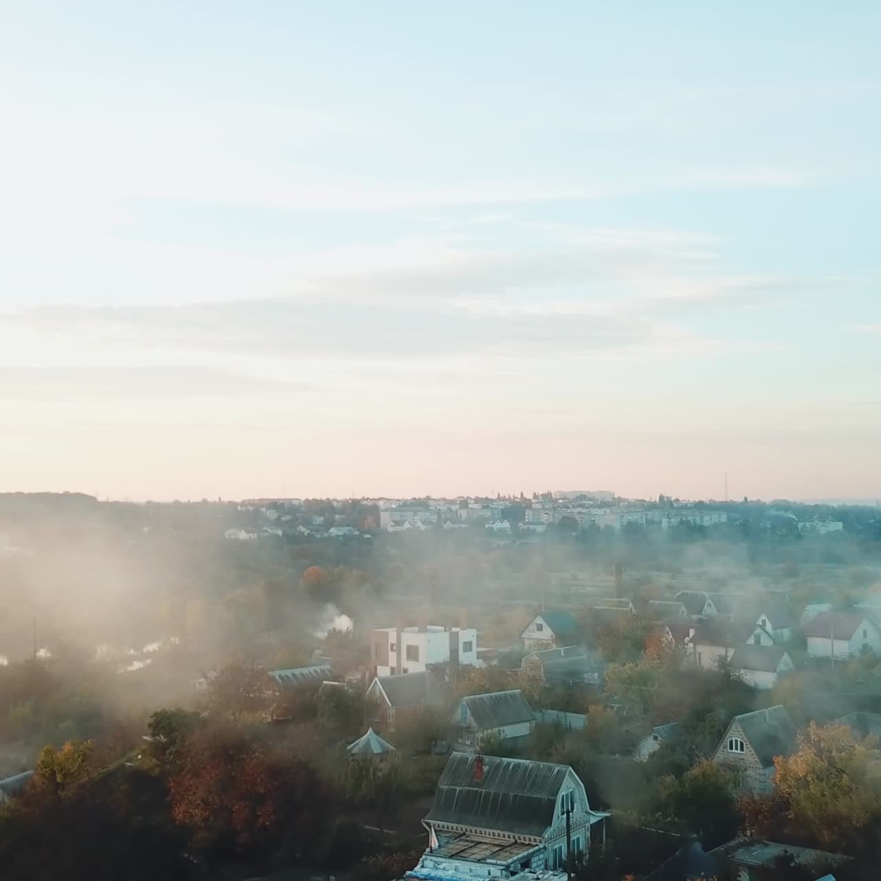 smoke are enveloping the private sector of the city as a result of a fire after a drought. Aerial view