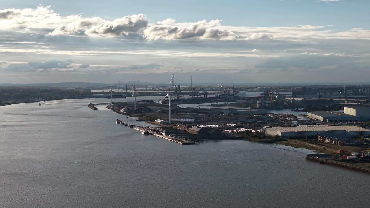 Port of Tilbury docks panoramic aerial view circling the River Thames shipping terminal in Essex