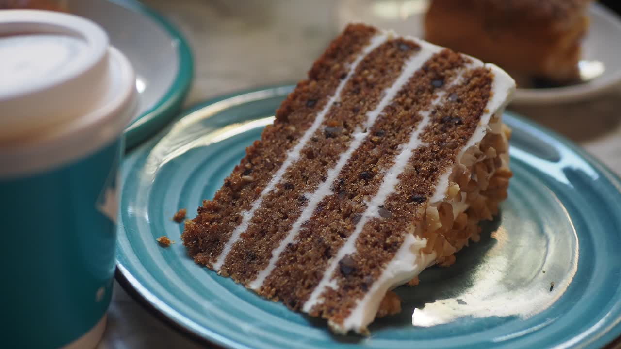 Delicious Slice of Carrot Cake with Coffee