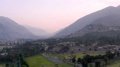 Beautiful-soft-pink-landscape-of-Santa-Eulalia-town-between-the-mountains,-Peru