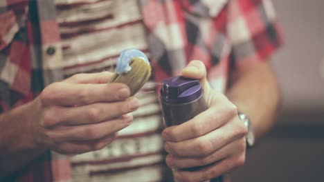 Shaving-gel-squeezing.-Beard-care.-Preparation-for-man-shaving