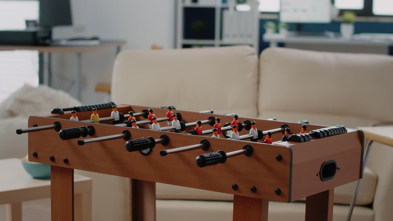Close up of foosball table to play football game having fun