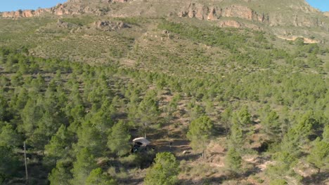 wild camping in remote jumilla region of spain, car roof tent, aerial view