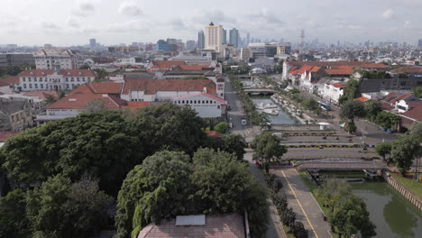 kota tua from above as drone tracks south towards central jakarta