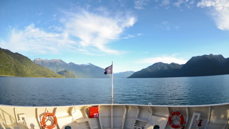 Bow-point-of-view-Time-lapse-of-a-ship-entering-Parque-Pumalin-fjord-at-predawn-near-Puerto-Montt-Chile