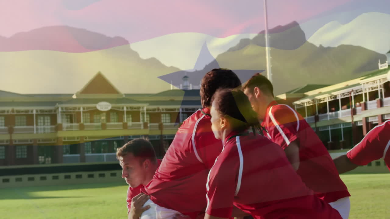 Practicing on field, rugby players in red jerseys with animation flag overlay