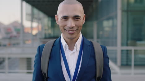 portrait of hispanic businessman smiling corporate education