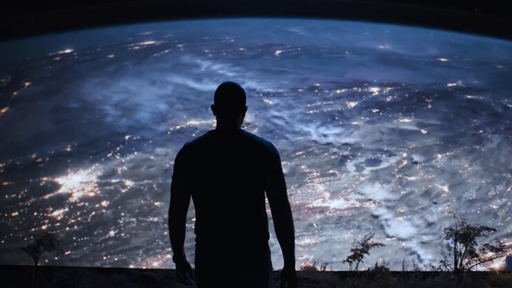Man Contemplating Earth from Space at Night