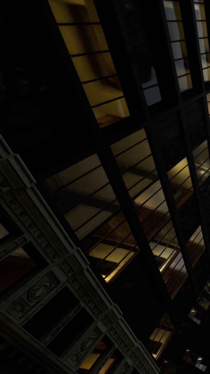 Reflections of lights and buildings at night in a city setting