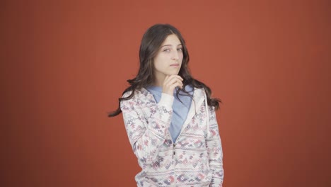 Young-woman-looking-at-camera-with-curious-expression.