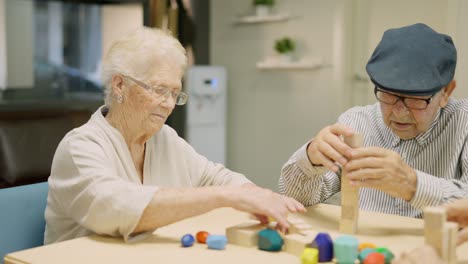 Elderly people playing a game