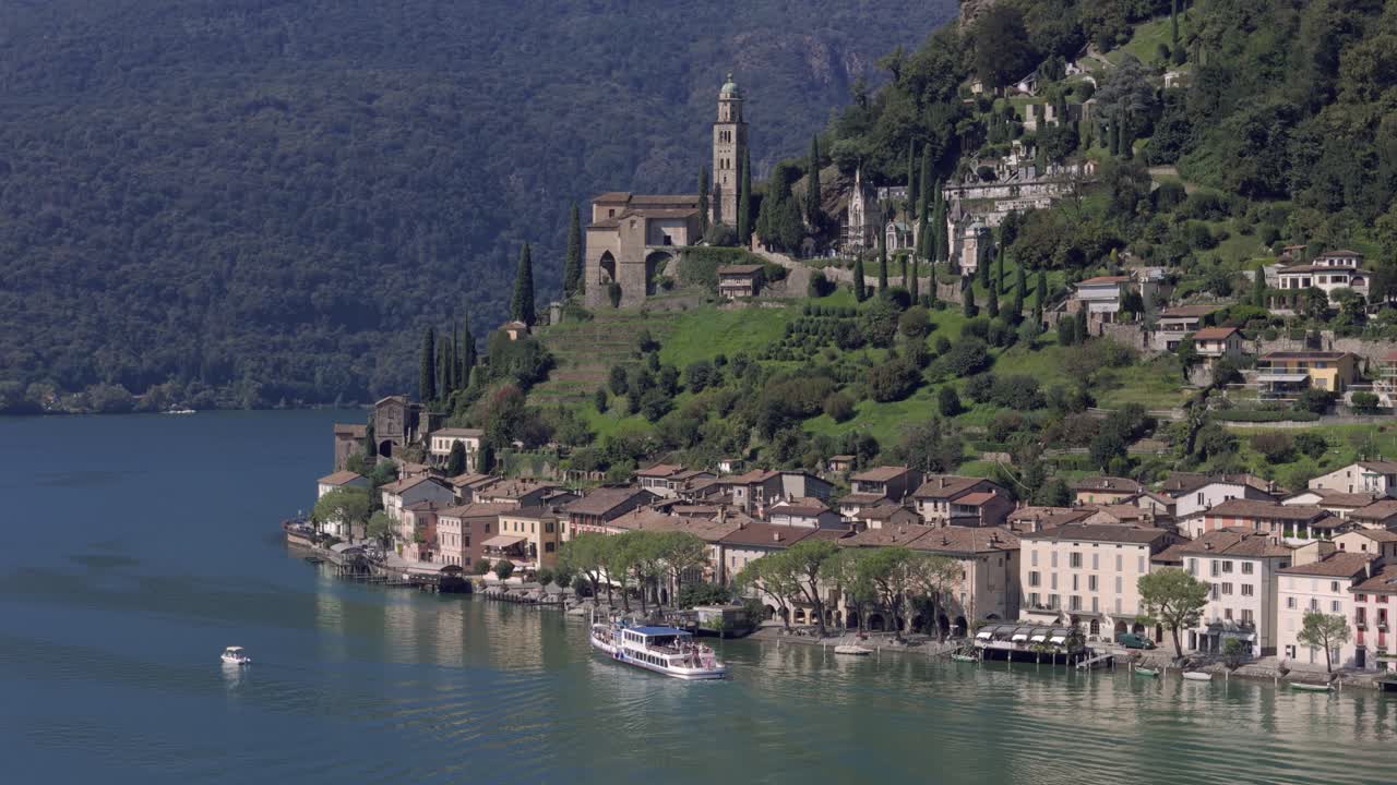 Ferry arrives at Morcote, Switzerland