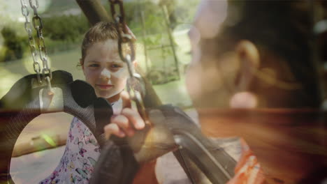 mother with her child on the swings