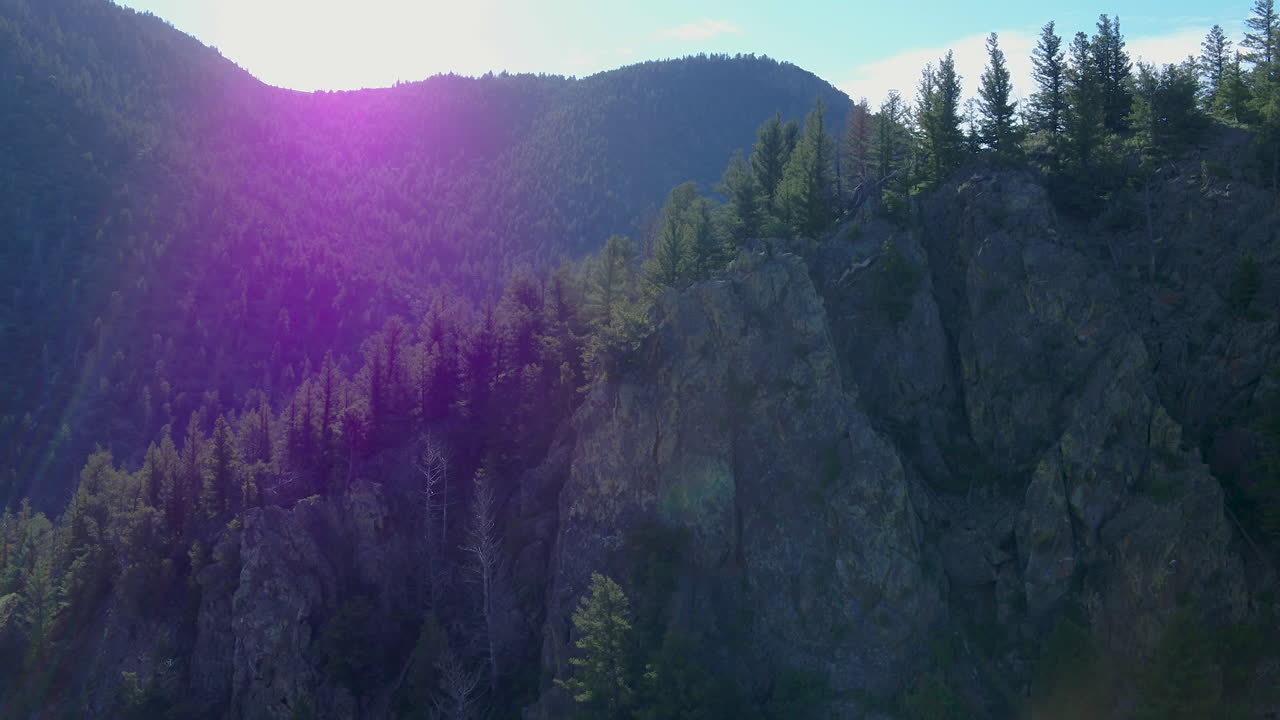 Aerial Drone Colorado Rocky Mountain Forest with Sun Flares