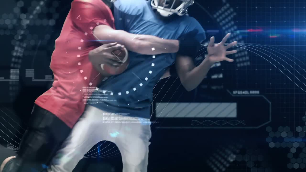 American football players tackling for ball