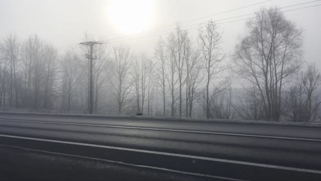 heavy smog polution, polluted air, large co2 and other emission, cars driving on foggy road
