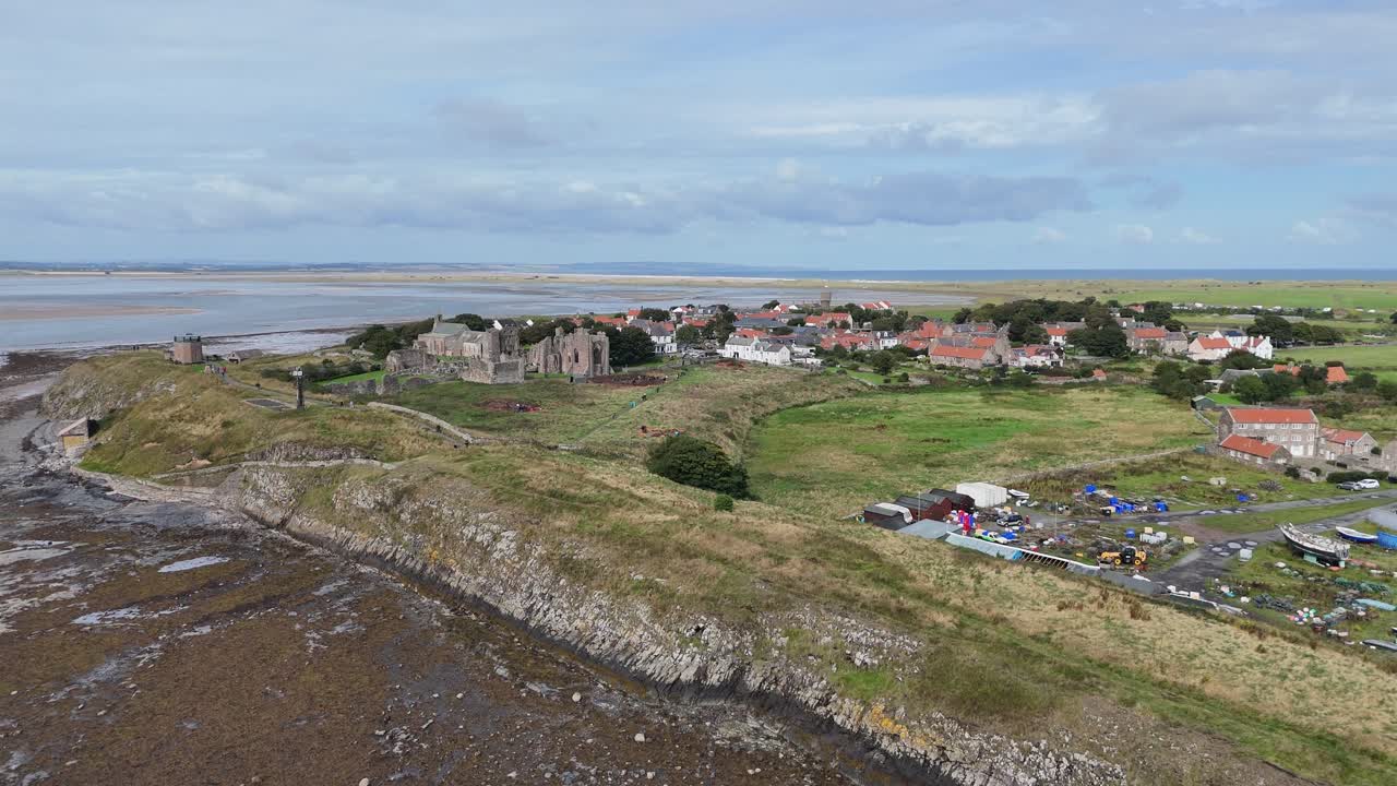 Lindisfarne priory holy island England drone,aerial summers day