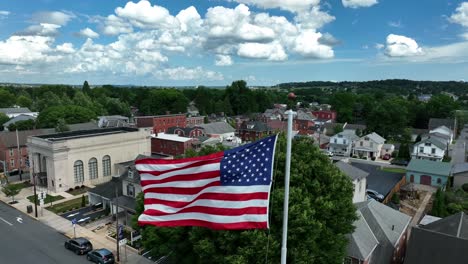 american flag proudly waves