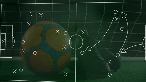 Animation-of-strategy-of-soccer-game-over-soccer-ball-and-leather-boots-against-net