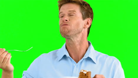 Mann-Genießt-Einen-Köstlichen-Kuchen-Auf-Einem-Greenscreen