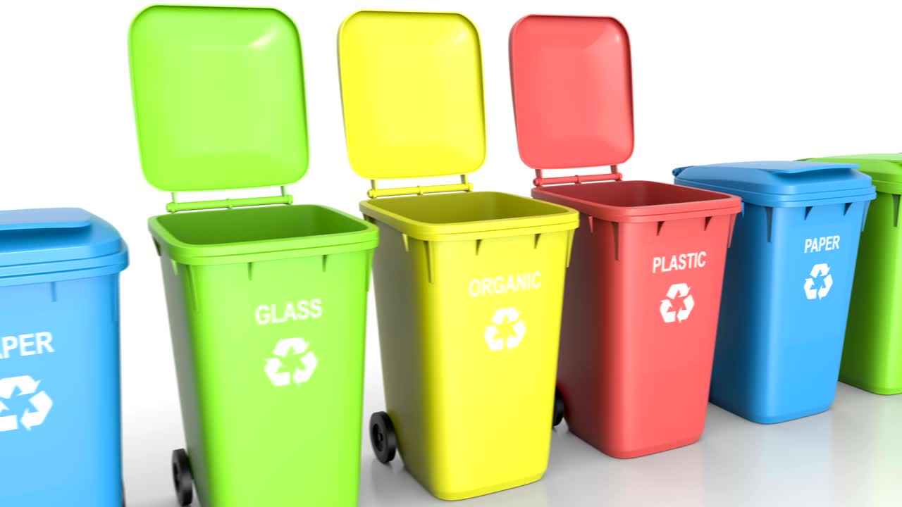 Plastic waste bins with flaps open and close and waste type labels white floor