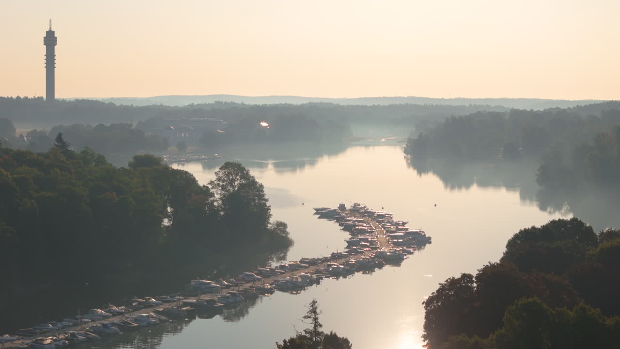 Telephoto sunset aerial view over Djurgårdsbrunnsviken with docked boats