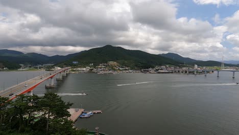 boats sailing at geoje island with two bridges in gyeongsangnam-do, south korea