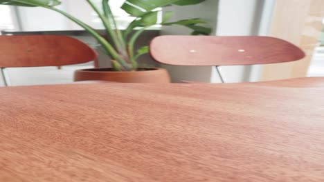 cafe interior with wooden furniture and mobile phone