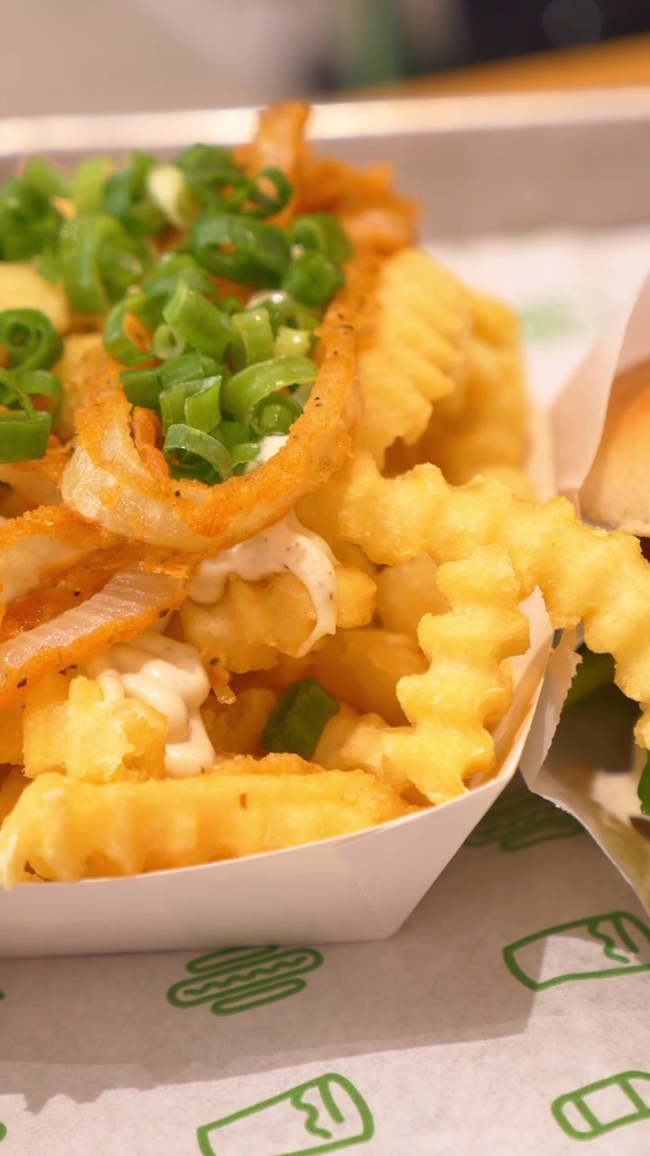 Close-up of a Chicken Sandwich and Crinkle-Cut Fries