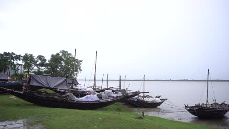 many boats stood on the river bank of ganges