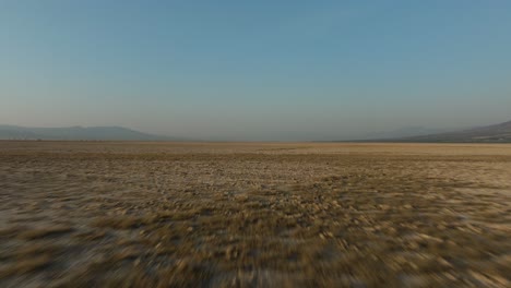 drone shot of a desert in mexico at sunrise on a clean day