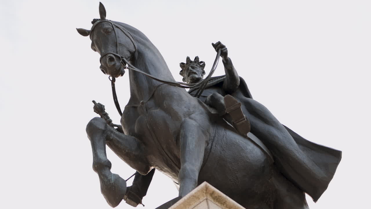 Looking Up At Sculpture Of King Ferdinand I of Romania on Unirii Square In Oradea, Romania. low angle shot