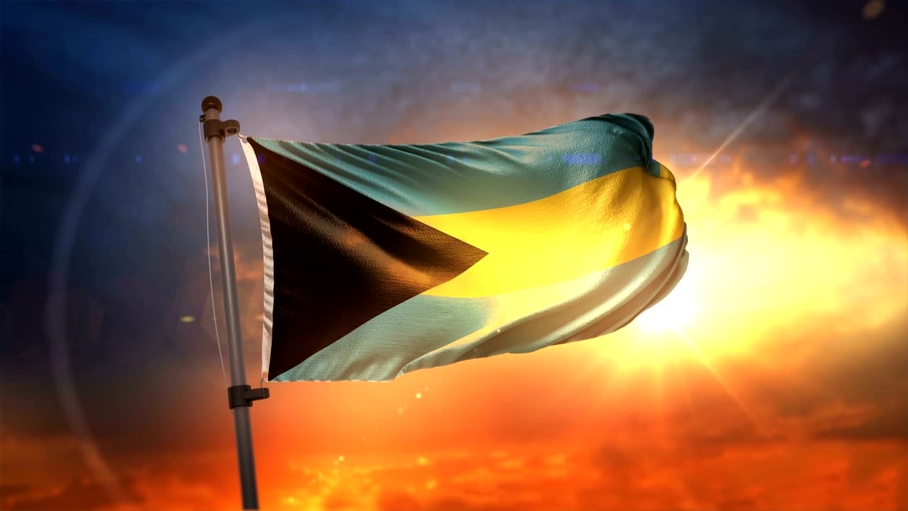 la bandera de las bahamas retroiluminada en el hermoso amanecer en cámara lenta 4k