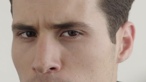 close-up-attractive-young-hispanic-man-face-looking-angry-frowning