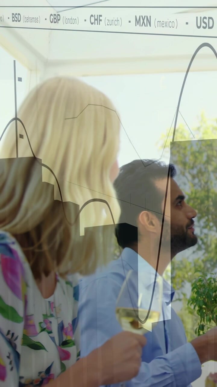 Vertical video: Women listening while man entering raising glass, discussing finance, charts moving