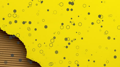 animation of grey spots, rings and hexagons over colourful ripped paper textures