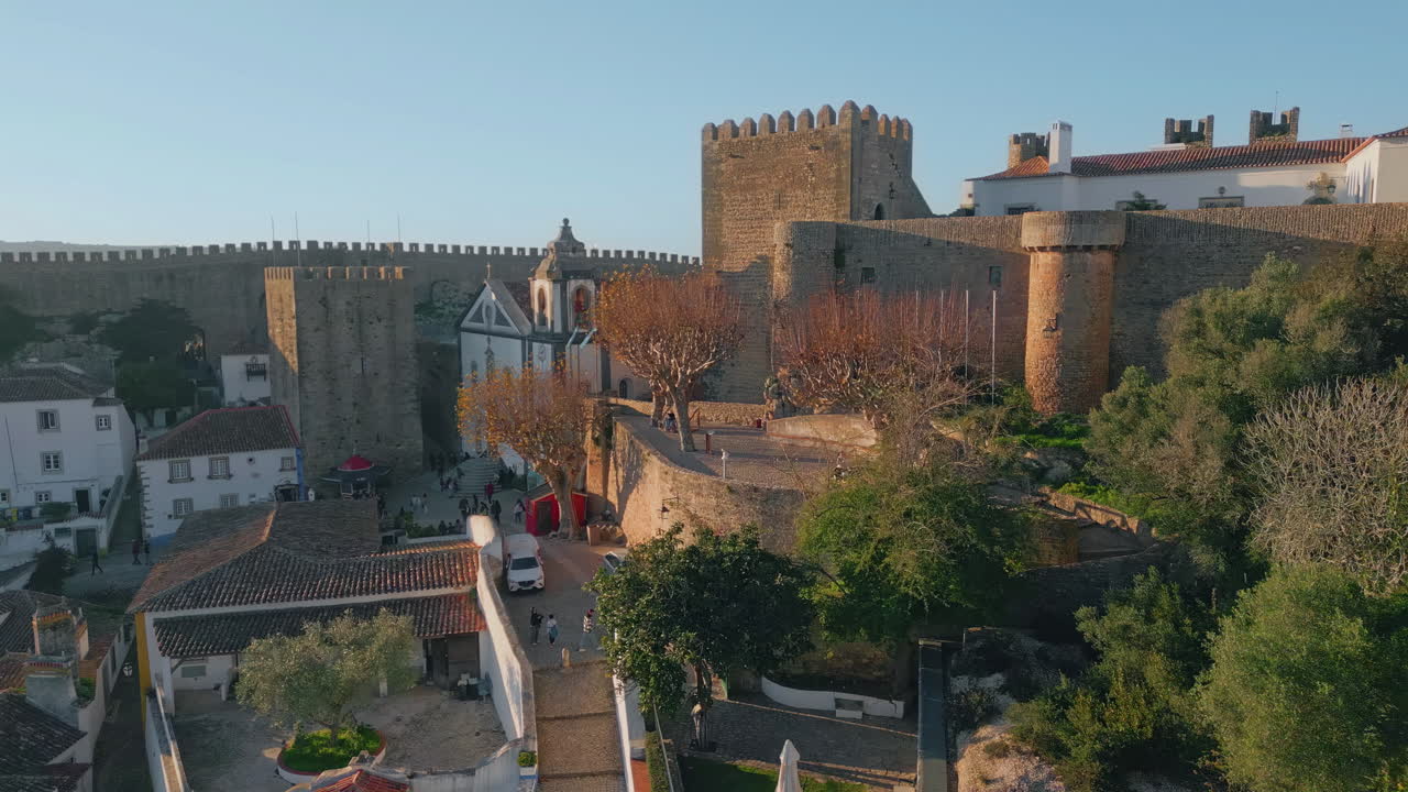 Castle courtyard medieval architecture and fortification walls drone view.
