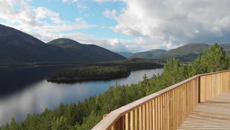 elevated wooden boardwalk by the lake fyresvatn in hamaren, fyresdal norway