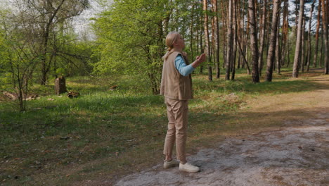 woman enjoying a walk in the forest
