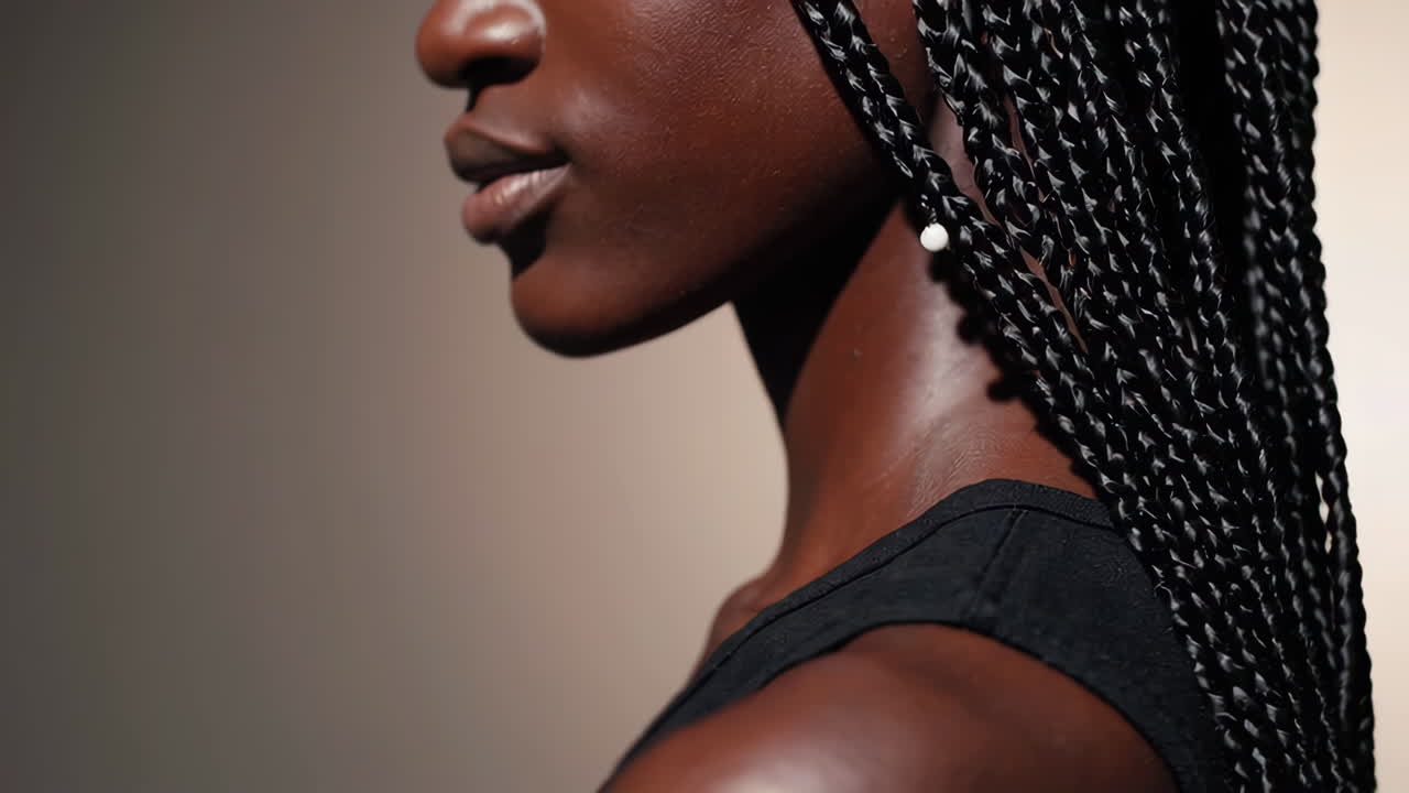 Close-up portrait of a woman with braids