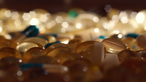 different drugs pills pharmaceutical industry rotate in macro close up , antibiotics and vitamins healthcare medical pharmacy concept