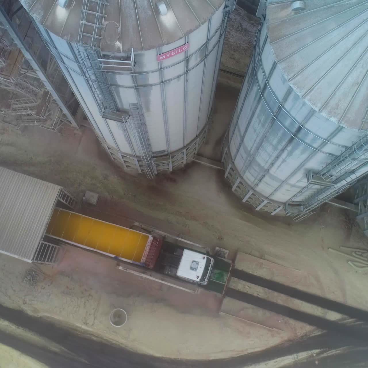 Big steel elevator storage silos. Huge industrial elevator storages. Aerial view