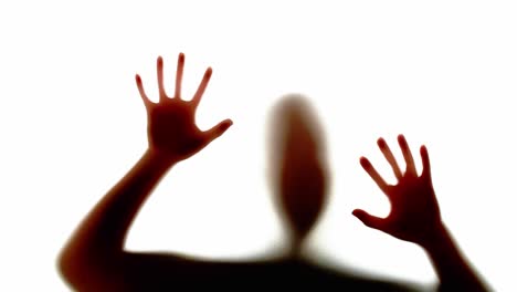 abstract and spooky defocused hand on white background