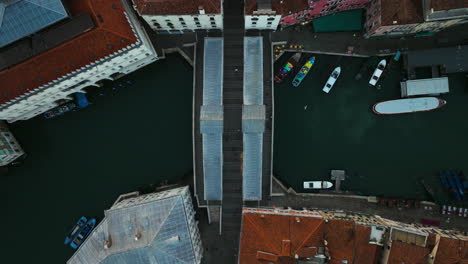 top view of famous rialto bridge in venice, italy - aerial drone shot