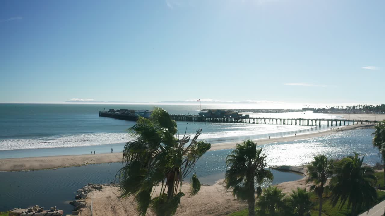 Low aerial rising shot of Stearns Wharf in Santa Barbara, California. 4K