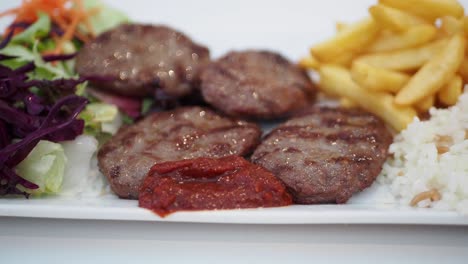 turkish kofte meal with fries and rice