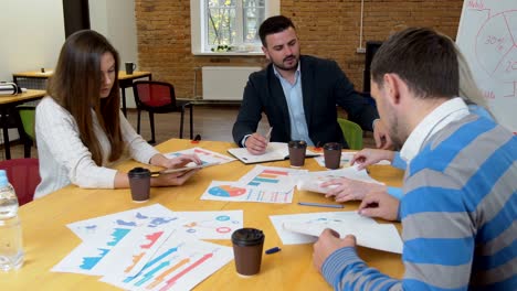 business team meeting involved diverse people participating in creative sustainable ideas steadicam shot across boardroom table shared work space