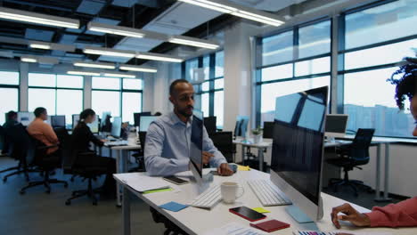 professionals collaborating and analyzing data in a modern office