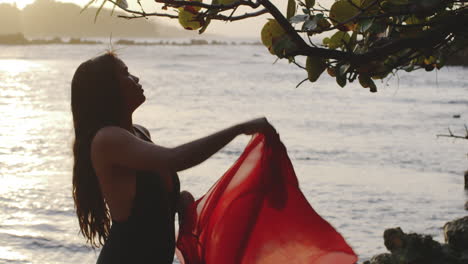 latino girl on tropical island at dusk enjoys peaceful view contemplates going for swim, copy-space